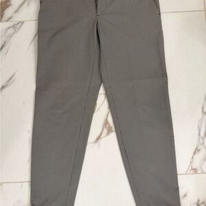 Prada Men's Stretch technical fabric trousers.